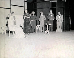 Masquers--"Thieves Carnival" 1958: Actors in Fancy Clothing on Stage