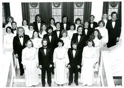 Portrait of Choir in Matching Formal Wear on Staircase (Part of the NMU Historic Photographs Collection)