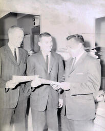 (658) Basketball--Awards from Marquette Junior Chamber of Commerce--Wayne Monson, Stan Allbeck, Connie Serhay 1961