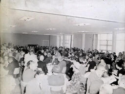 Superintendent and School Board Member Meeting 1961: View of Large Crowd of People at Tables