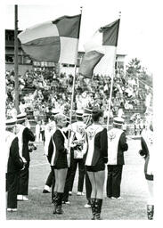 Back View of Marching Band Performing at Football Game (Part of the NMU Historic Photographs Collection)