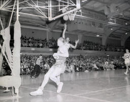 (602-01) NMC Basketball--Aquinas Basketball 1960-61: Basketball Players on Court During Game