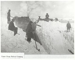 Snow plowing with wedge plow on train