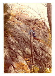 Competitor Climbing Down Cliff Face (Part of the NMU Historic Photographs Collection)