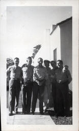 Tom Ross with Soldiers and Woman