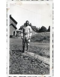 Tom Ross in Ontonagon Baseball Uniform with Hat in Hand