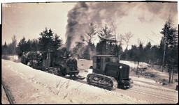 Logging Locomotive Pulled By Tractor