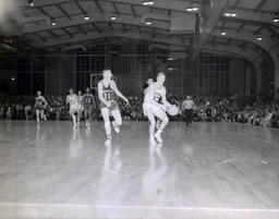 NMC Basketball--Aquinas Basketball 1960-61: Basketball Players on Court During Game