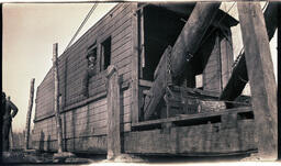 Man Operating Crane and Pulley