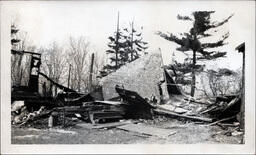 Burned and Demolished Remains of a Roof