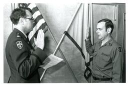 Two Men Taking an Oath (Part of the NMU Historic Photographs Collection)