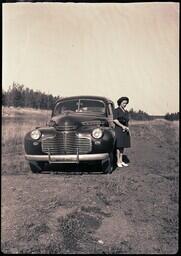 (132-023) Mrs. Dobbek with Car