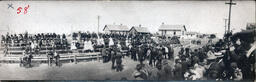 Spectators Gathered around Cart