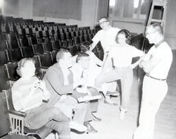 (618-10) Masquers--"Studio Three" Summer 1960: Group of Theater Members Talking of Stage