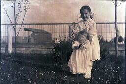 (039-005) Children on Lawn in the Spring