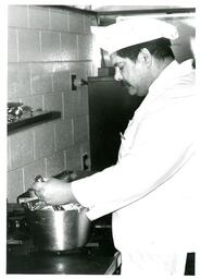 Kitchen Staff Whisking Something in Pot (Part of the NMU Historic Photographs Collection)