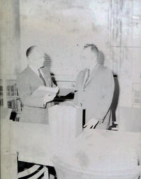 (627-01) Library Presentation--L.W. Jenner, President; Cliffs Down C.C.; Norman J. Bunker NMC Librarian Apr. 5, 1961