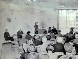 West Hall Dedication Fall 1960: View of Woman Giving Speech From Behind the Crowd