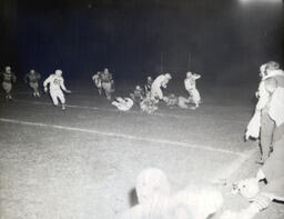 Intrasquad Football Game Spring Practice--Outstanding Back: Mike Strebel, Outstanding Lineman: Wayne Sickler 1961: Distance Photo of Action