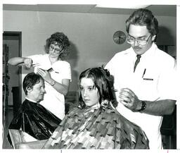 Robert Botsford and Liz Hass (Mass?) Cutting Hair (Part of the NMU Historic Photographs Collection)