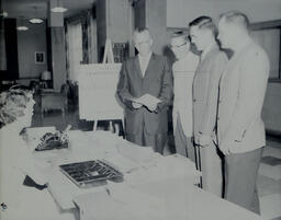 Michigan Association of School Administrators--Summer 1960: Four Men at Registration (1)