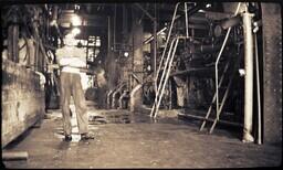 (010-005) Man Posing in Room of Machinery