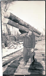 Man Hauling Logs, 1 of 2