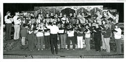 Choir Practicing on Decorative Stage (Part of the NMU Historic Photographs Collection)