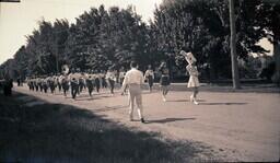 (008-011) Marching Band Performing on Dirt Road in Ontonagon Fourth of July Parade