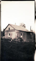 Man on House Porch, 1 of 2