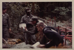 Competitors Running Out of a Starting Gate (Part of the NMU Historic Photographs Collection)