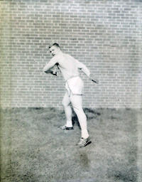 NMC Track Team 1961: Track Athlete by Brick Wall