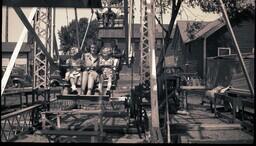 (008-030) People Riding Ferris Wheel