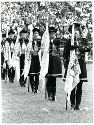 Color Guard Lined Up with Wildcat Flags (Part of the NMU Historic Photographs Collection)