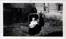 Baby in Wicker Buggy