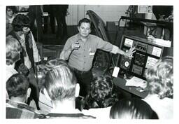 Professor and Group of Students Gathered around Diagnostic Pulsar Scope Machine (Part of the NMU Historic Photographs Collection)