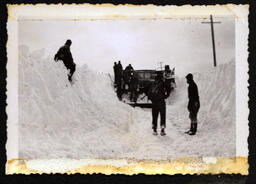 Men Working on Snow Plow