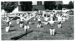 Baton Twirlers Practicing Outside Hedgcock Building (Part of the NMU Historic Photographs Collection)