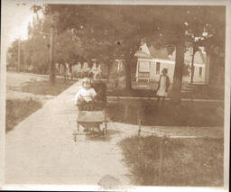 Children on Wheeled Toy