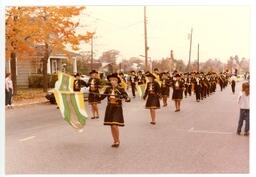 Marching Band Performing in Homecoming Parade (Part of the NMU Historic Photographs Collection)