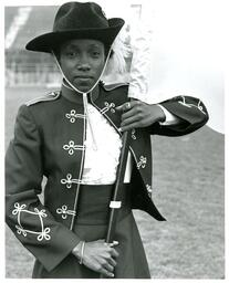 Portrait of Color Guard Member Posing with Flag (Part of the NMU Historic Photographs Collection)