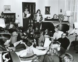 Group of Students Singing in Living Room (Part of the NMU Historic Photographs Collection)