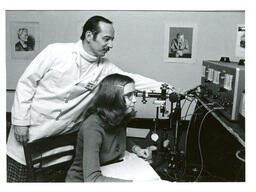 Student and Professor with Machine (Part of the NMU Historic Photographs Collection)