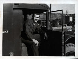 Soldier in U.S. Service Vehicle