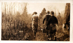 Four People on Dirt Road