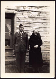 Soldier and Woman next to House (2 of 2)