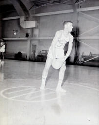 (590-02) NMC Basketball--Jerry Wright;Bob Armstead;Group Picture 1960-61: Northern Basketball Player on Court