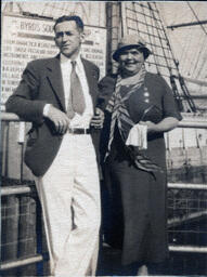 Man and Woman Standing Dockside