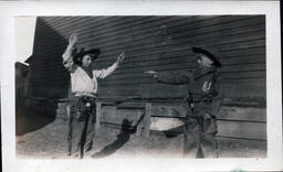 Young Tom Ross and Friend Playing Cowboys