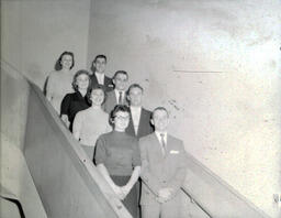 Organizations--Various: Four Men and Four Women Standing on Stairs